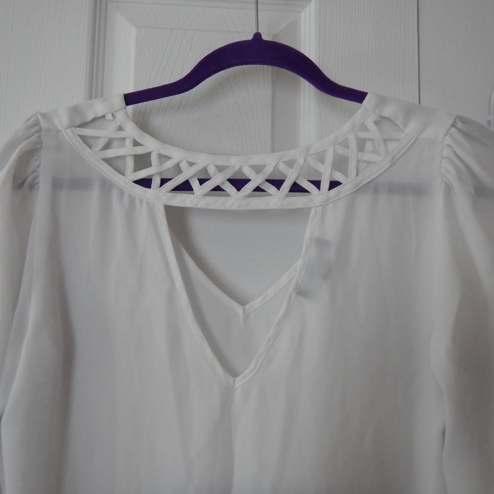 Women's white blouse with funky back!
